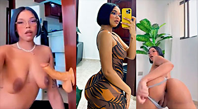 Esposa de Santana Barber Shop Peny Rodríguez cantando un consolador