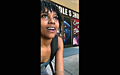 The skinny girl is caught with a dildo in the middle of the street
